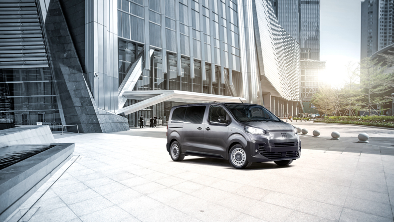 Fiat Professional utility vehicle parked near warehouse